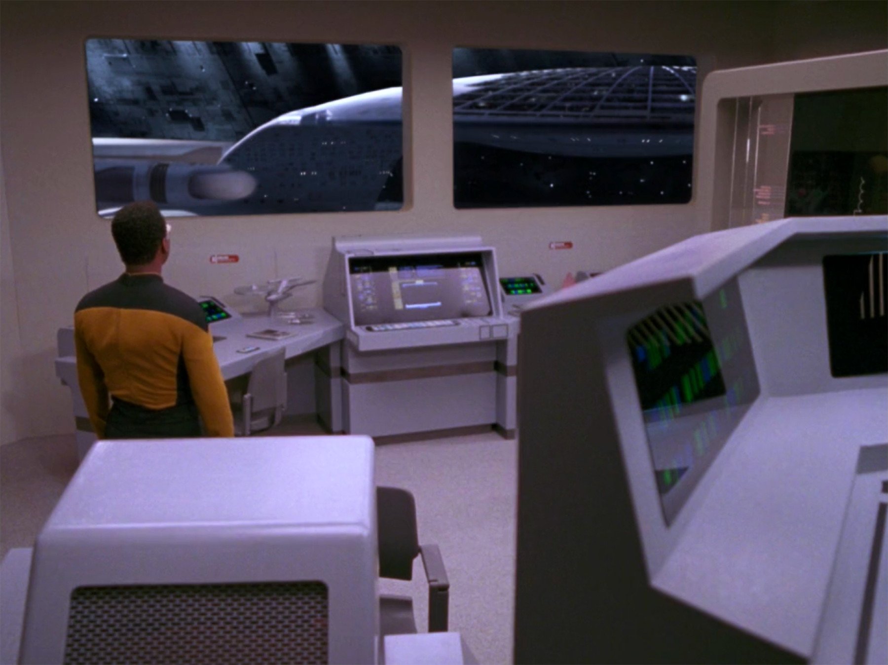 Geordi LaForge in a holographic representation in drafting room 5 of Utopia Planitia